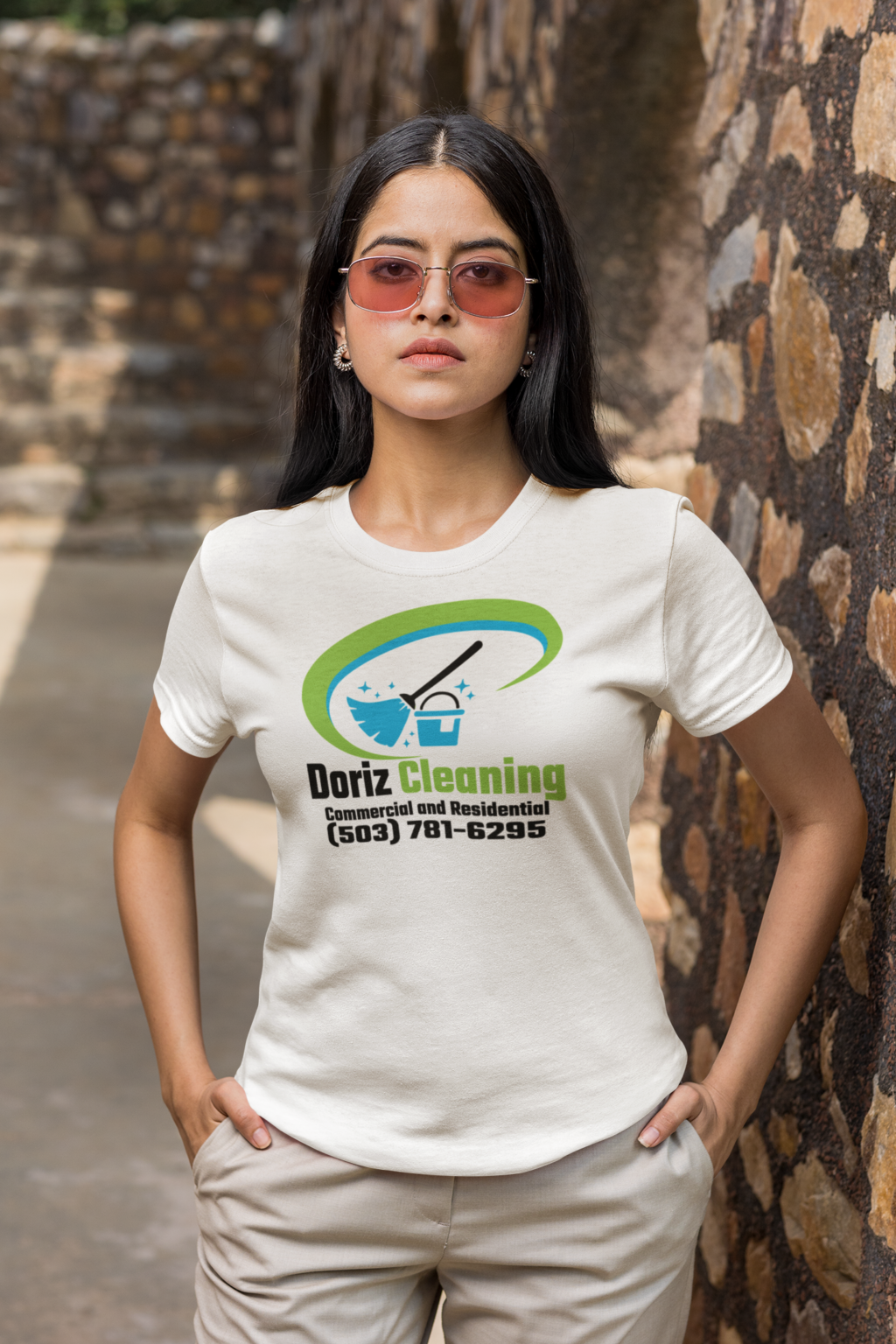 basic-t-shirt-mockup-featuring-a-serious-woman-with-sunglasses-with-her-hands-in-her-pockets-m26378